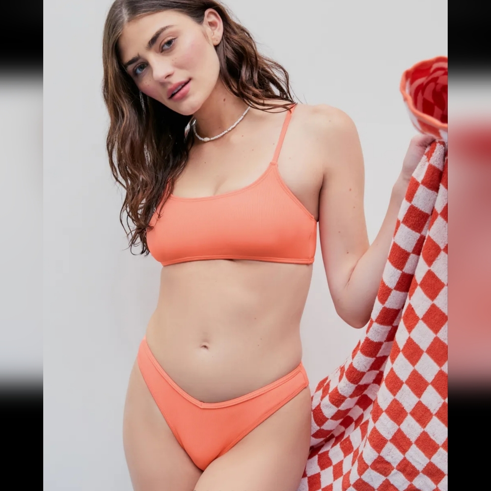 Brand new, never used, size S. Orange pink color